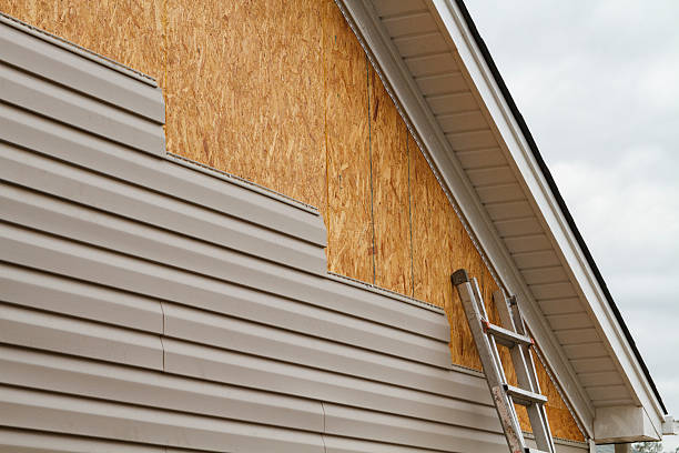 Professional Fiber Cement Siding technician working in Roosevelt, NY